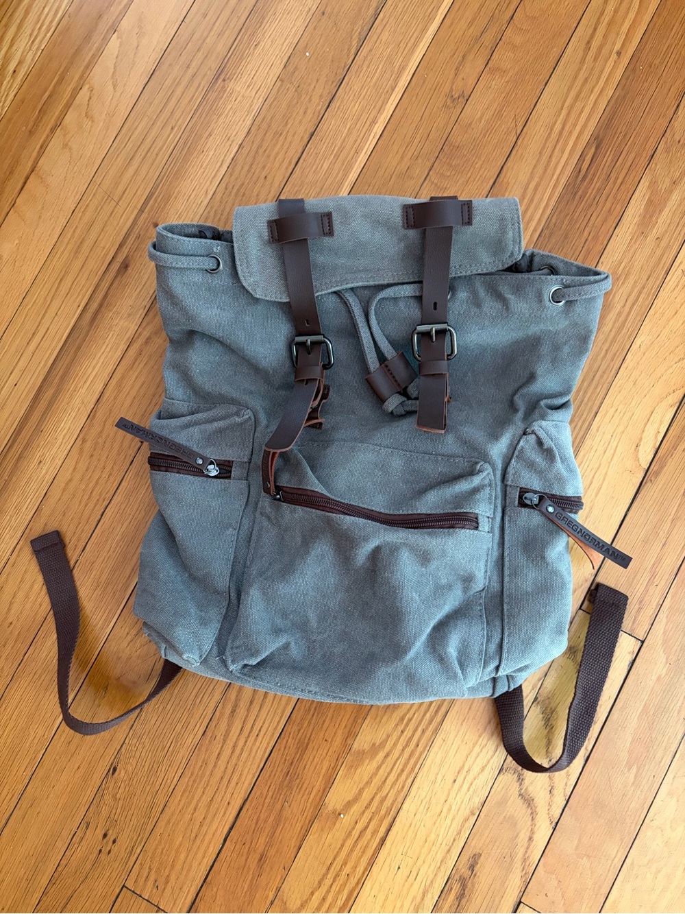 Greg Norman Refined Traveler Canvas Backpack Brown Leather Straps. 
Classic Golf